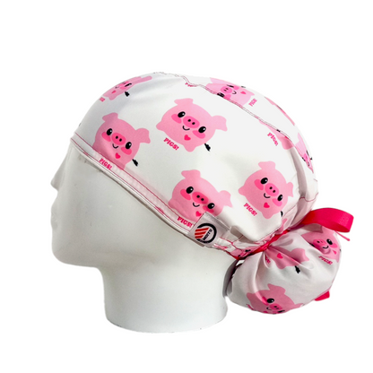 Gorro Quirúrgico Mujer y Portacarnet Cerditos Blanco - gorro antifluido para mujer Doctools - foto 1