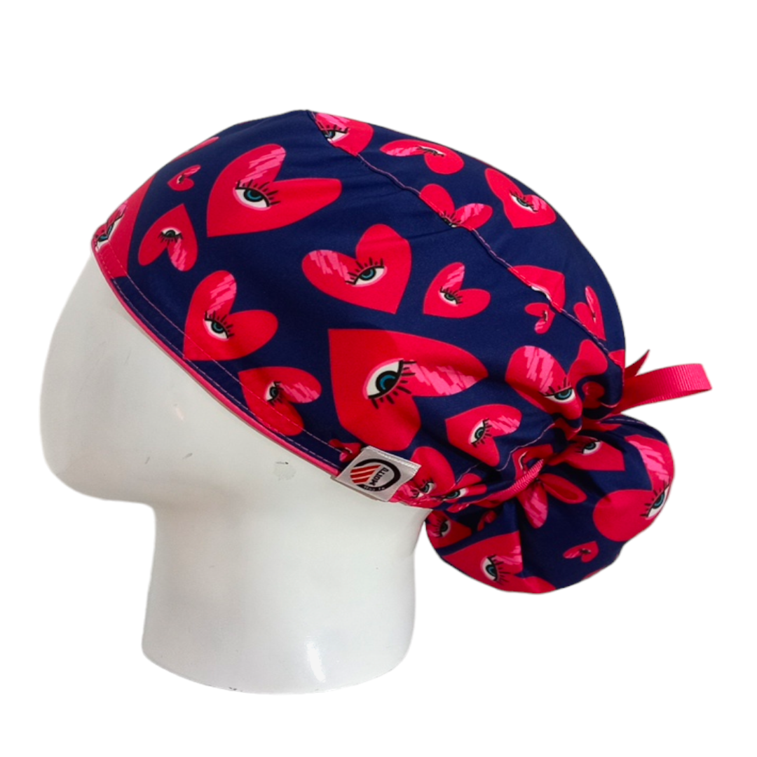 Gorro Quirúrgico Mujer y Portacarnet Corazones y Ojo Turco Azul Oscuro - gorro antifluido para mujer Doctools - foto 1