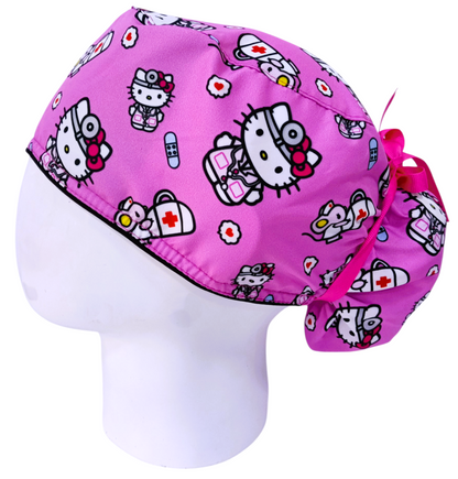Gorro Quirúrgico Mujer y Portacarnet Hello Kitty Médica Fucsia - gorro antifluido para mujer Doctools - foto 1