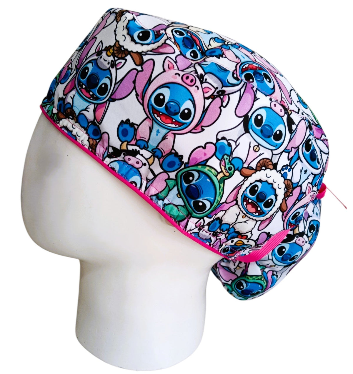 Gorro Quirúrgico Mujer y Portacarnet Stitch Trajes Fucsia - gorro antifluido para mujer Doctools - foto 1