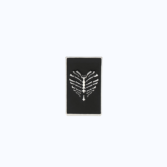 Metal Rib Cage Heart Pin