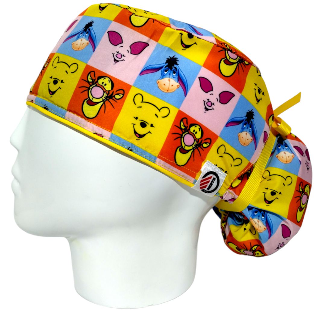 Gorro Quirúrgico Mujer y Portacarnet Winnie Pooh Caritas - gorro antifluido para mujer Doctools - foto 1